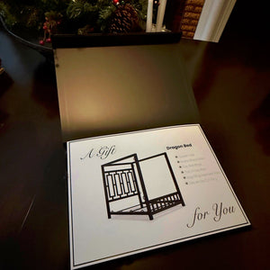 Open gift box with 'A Gift for You' message on a dark surface